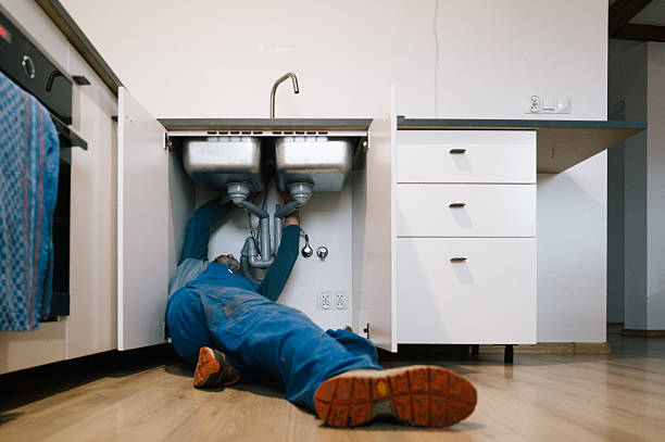 Professional Drain Cleaning technician working in Lewis, NY